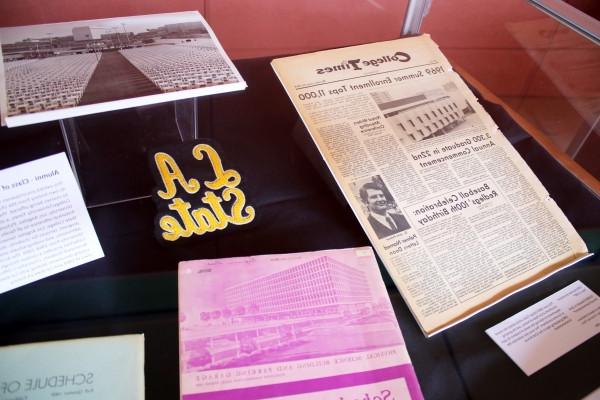 Alumni reunion memorabilia including a College Times issue from 1969 and LA State patch